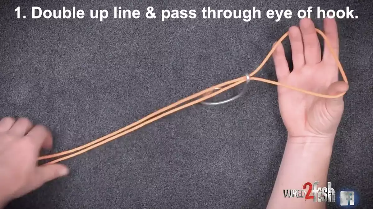 Step 2 of tying the 3-tag knot for fishing