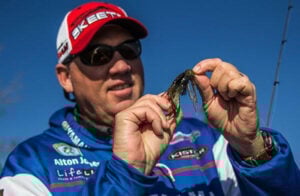 alton-jones-holding-football-jig-for-bass.jpg