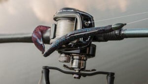 big-bite-baits-kriet-tail-worm-on-fishing-reel.jpg