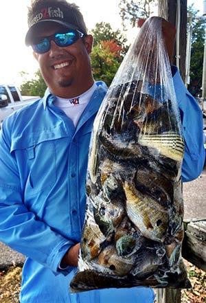 jason-with-big-bag-of-bluegills.jpg