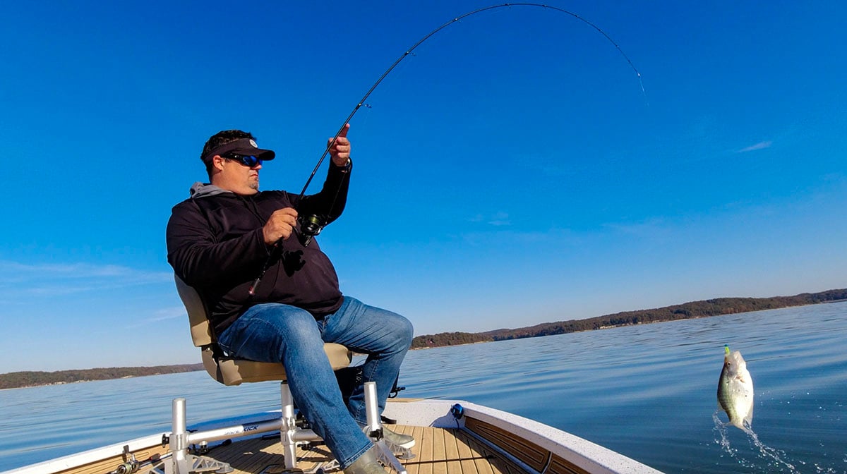 Jason swinging big crappie on spinning gear