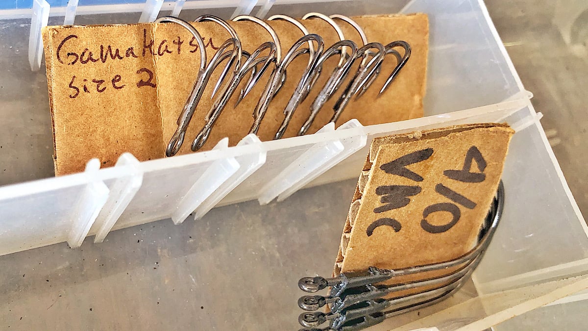 bass fishing hooks on cardboard