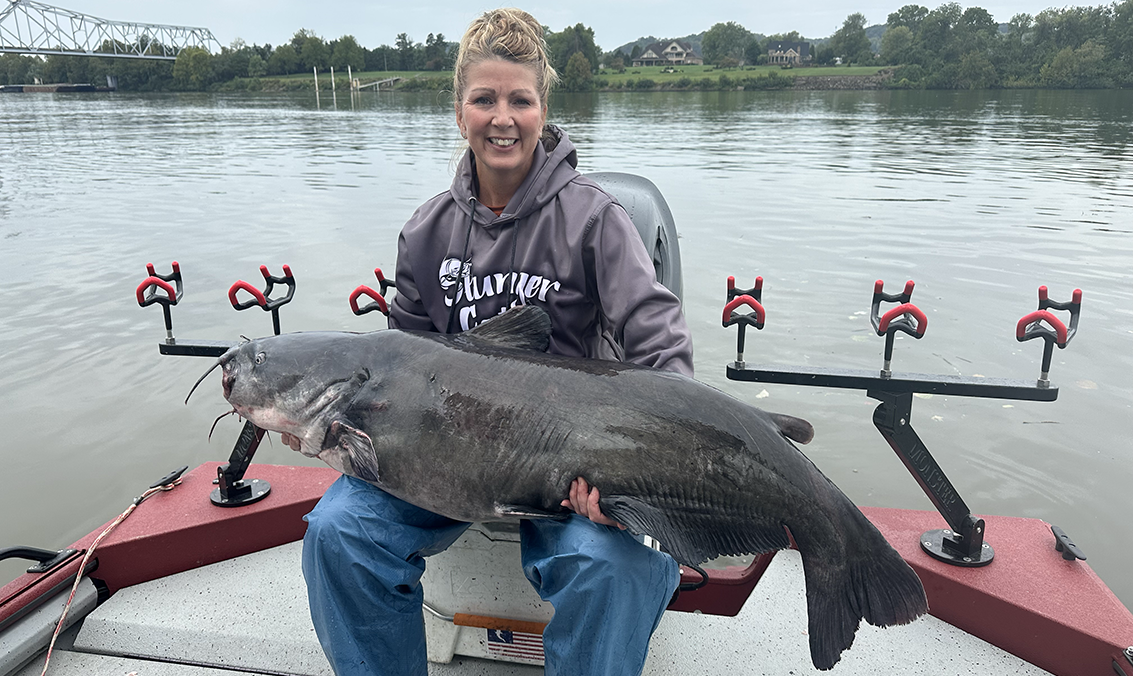 Kim Feltner with record blue catfish
