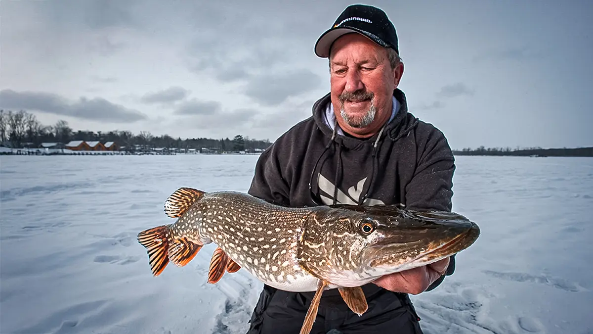 older angler on the ice