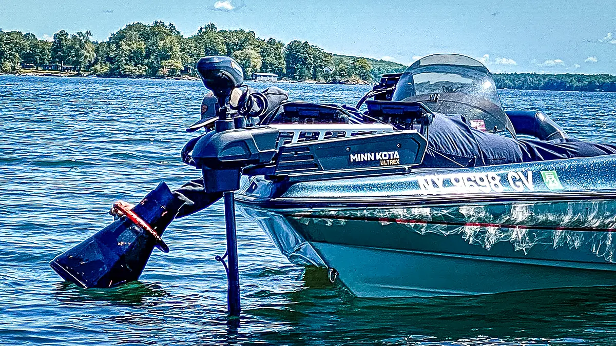 angler in bass boat using a flogger