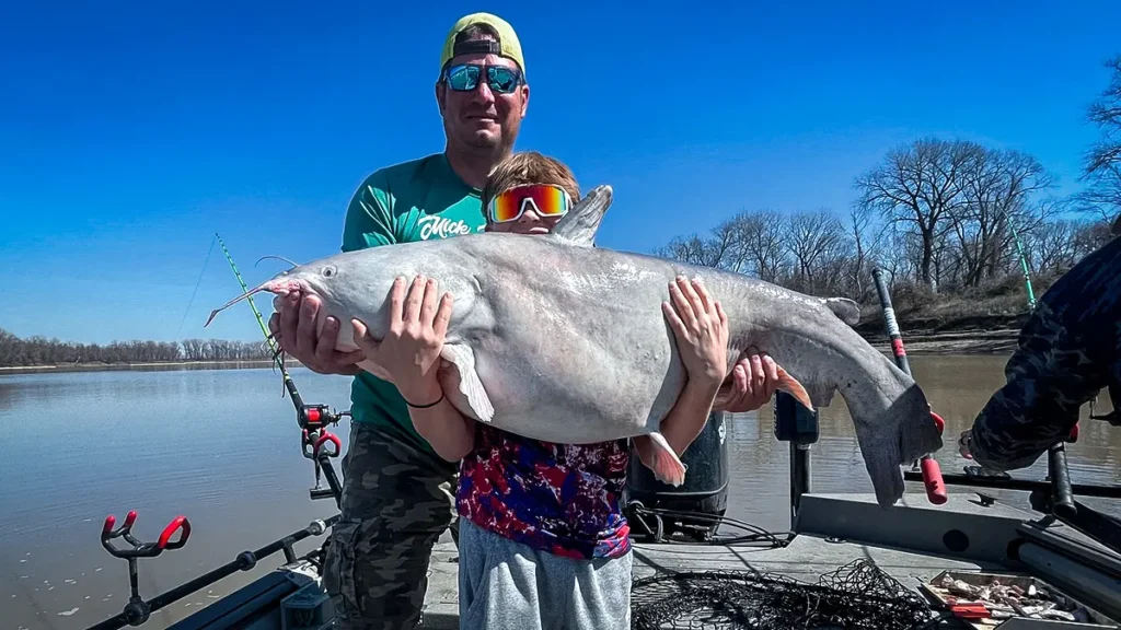 big cat and small kid