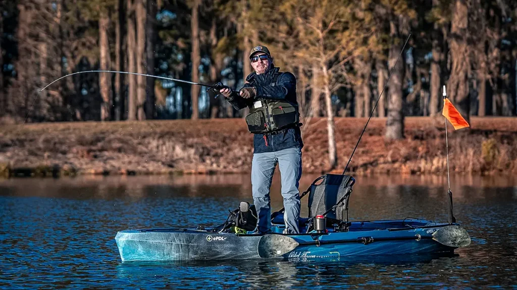 Old Town Sportsman fishing kayak with man fishing