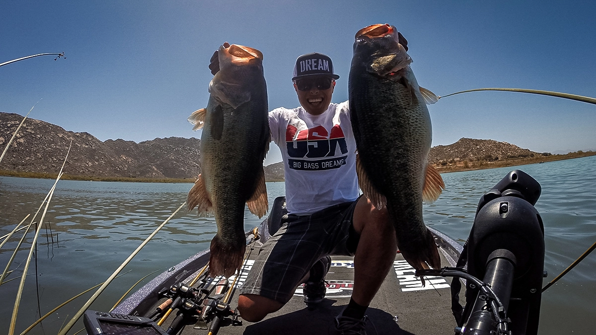 oliver ngy with two big largemouth bass