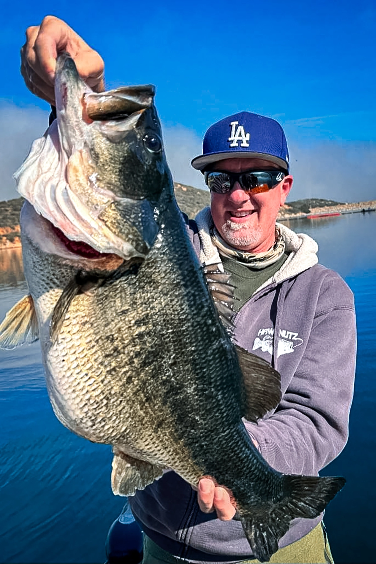 Jed Dickerson holds up his giant california bass