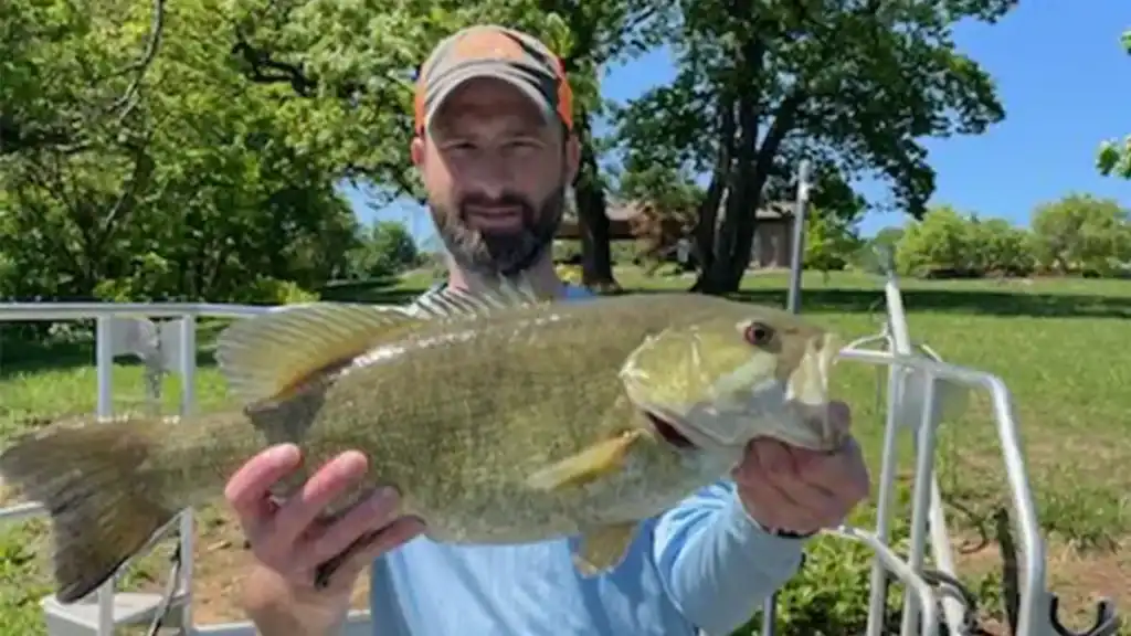 Luke Kowalewski with big Kansas smallmouth