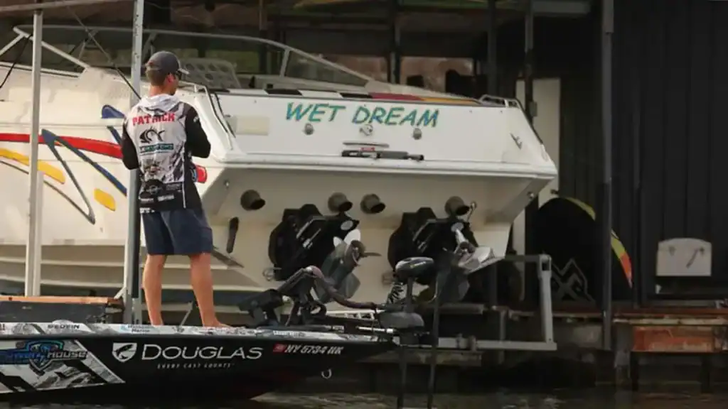 Kyle Patrick fishing a dock