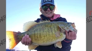Out-Fishing the Fiancé: St. Clair Guide Catches Her Holy Grail Bass