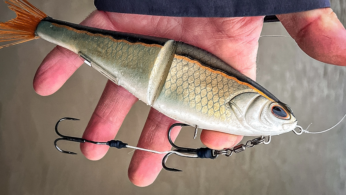 Open palm holding a Berkley PowerBait Chop Block