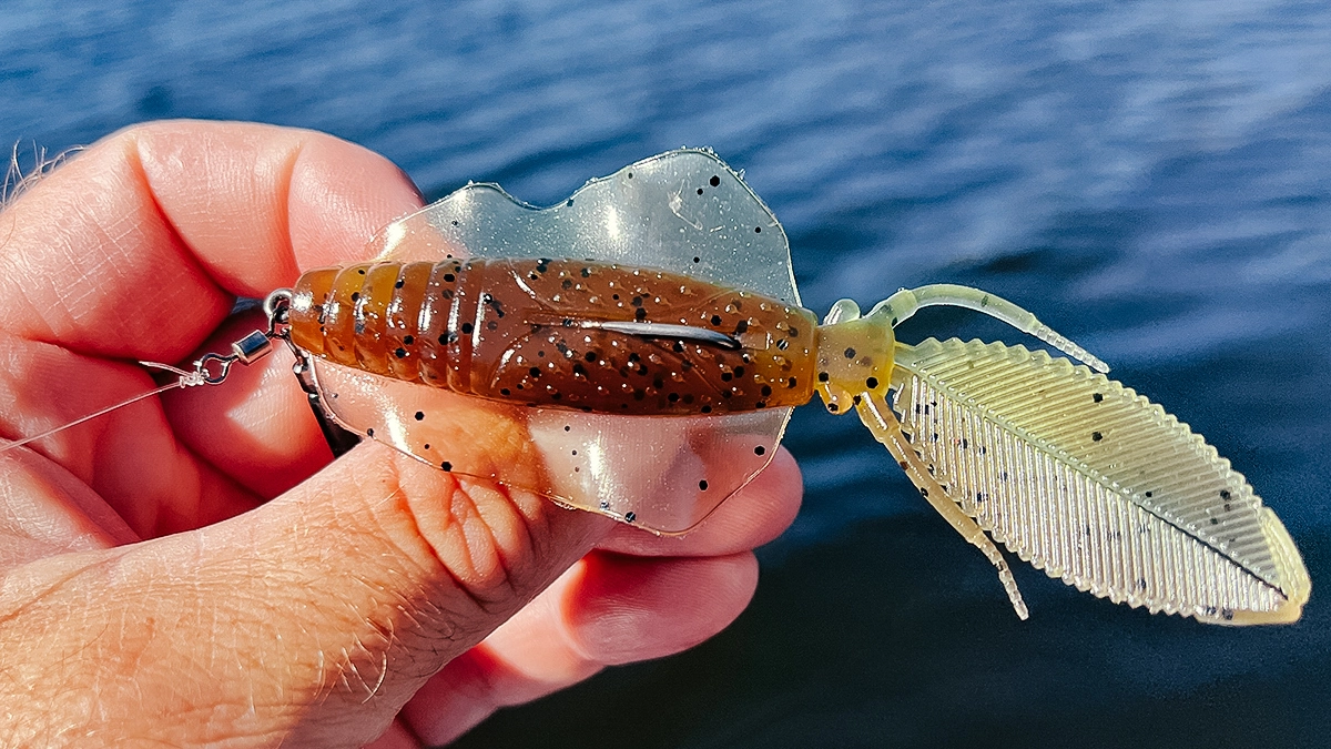 A closeup of the Chasebaits Flip Flop held over the water