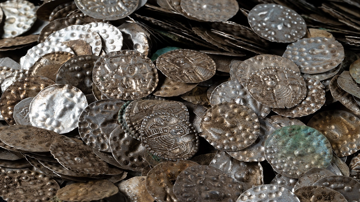 A cache of recently discovered 12th-century coins, many of which bear the likeness of Swedish king Knut Eriksson