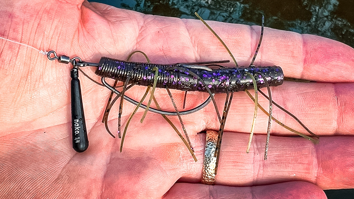 A closeup of a Nako Tungsten Jika rig held in an open palm