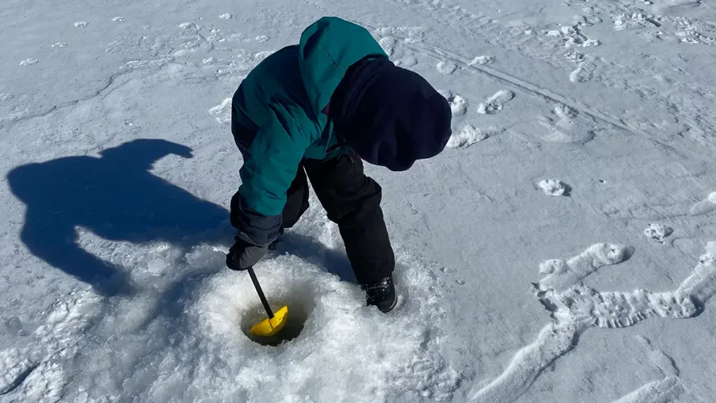 child ice fishing
