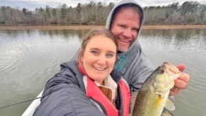 Two people with the February bass they caught