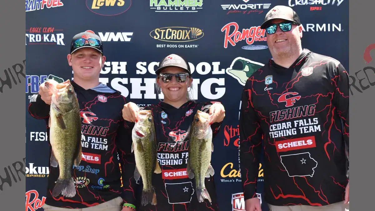 Kael Moore (left), his father and coach Carter Moore (right), and fishing partner Allie Wheelock celebrated during weigh-in at a high-school national tournament last year.