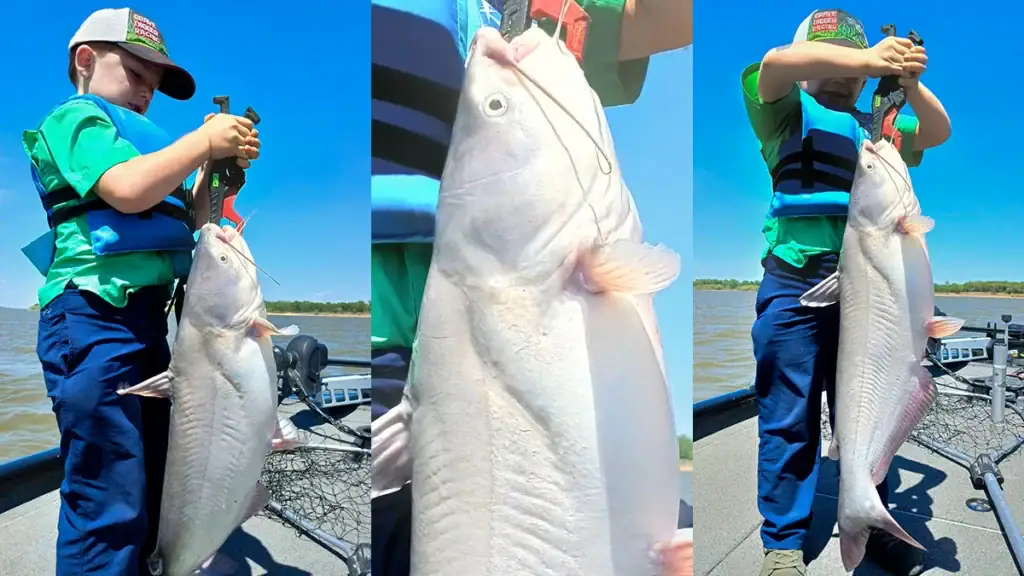 Sam Zinn and nearly 50-pound catfish he caught with his brother Ford.