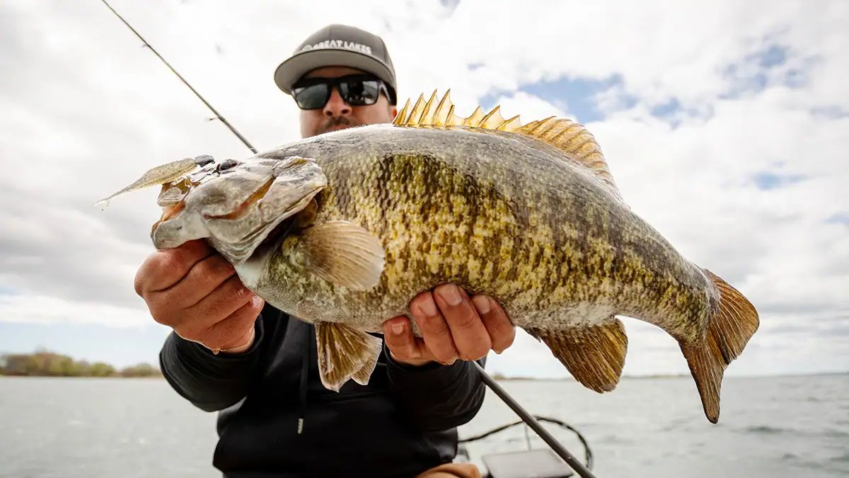 On the water with caught bass.