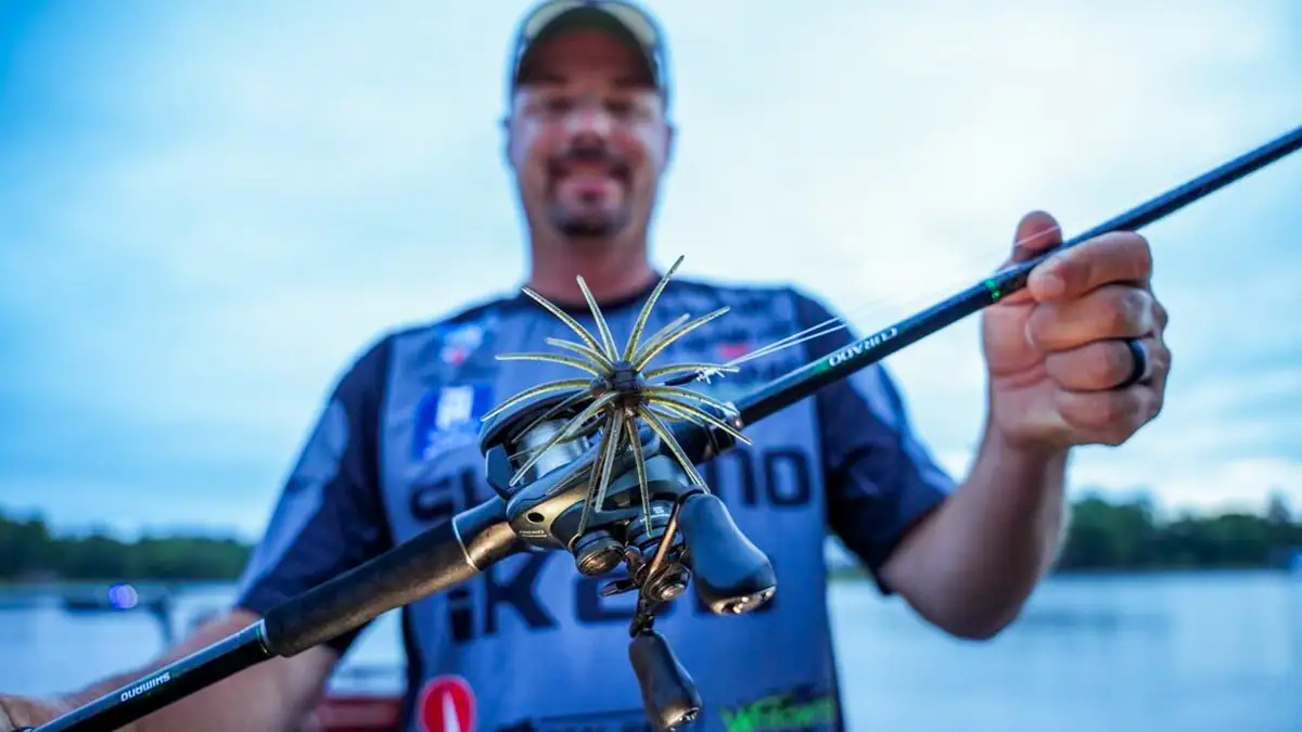Shimano Pro Alex Davis holds a Curado 72MH Rod paired with a Curado 150 M.