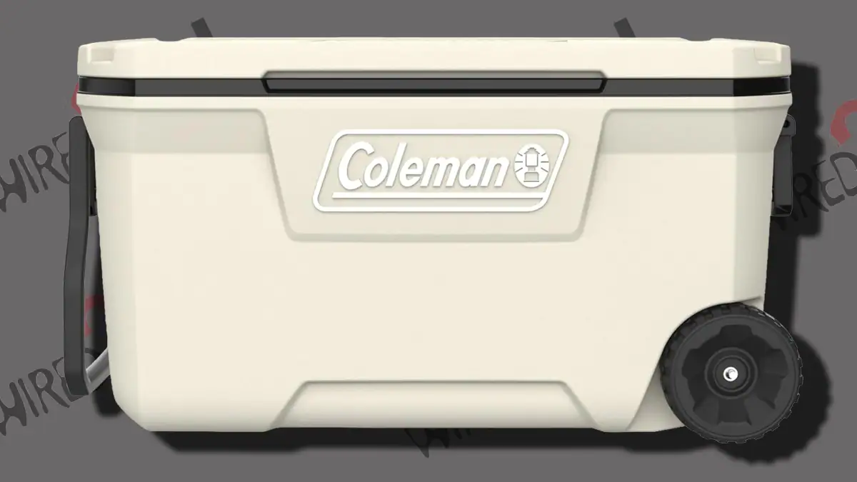 Beige Coleman 316 Series Wheeled Cooler.
