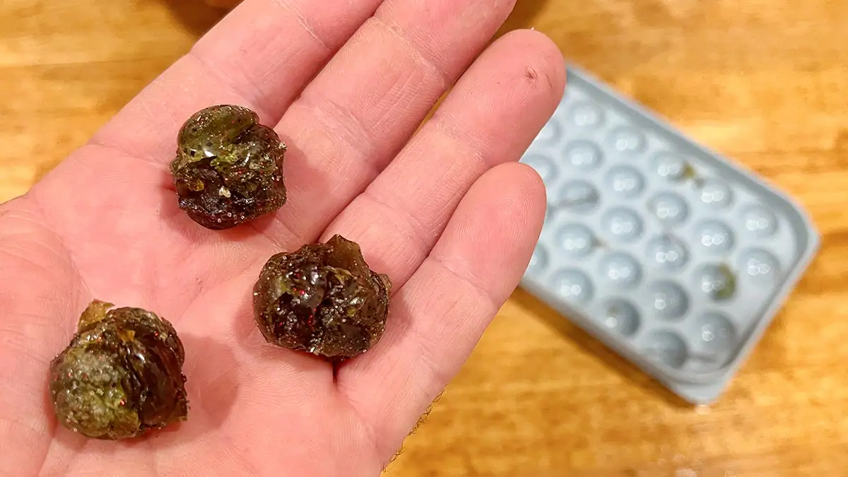 Melt down soft-plastic lures to form the bodies of each homemade urchin-style bait.