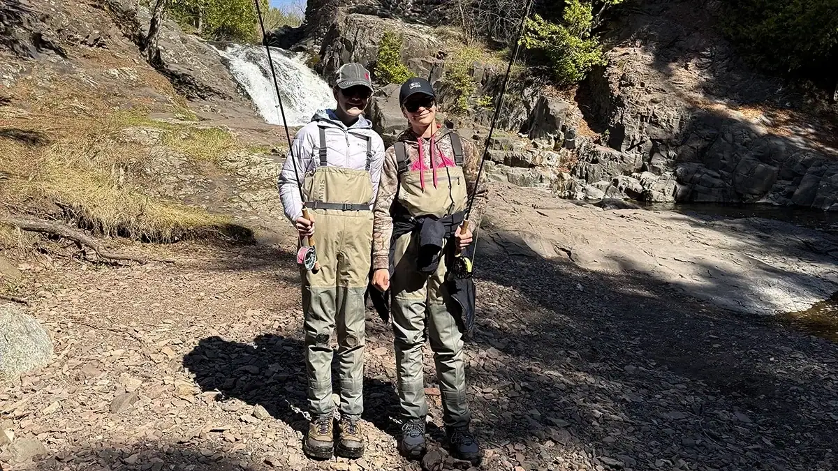 Sisters Sadie and Lucy Spatafore fishing in Minnesota.