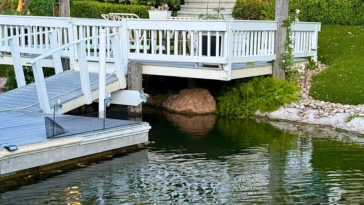 Despite the possible outer corners of this dock, the most likely spot to skip your Senko is underneath the ramp leading to the dock, between the piling and the big rock. This added cover makes for a cozy living room for Mrs. Bass, but a difficult cast. Take the shot.