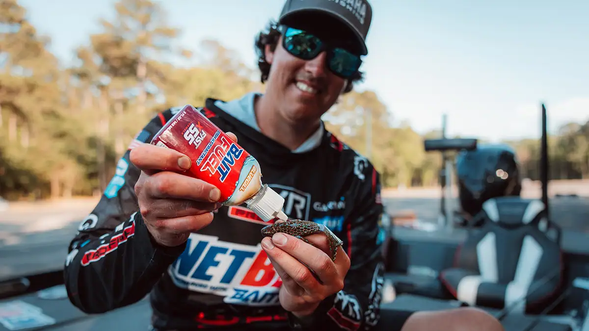 Showing how to apply American Baitworks' BaitFuel to a lure.