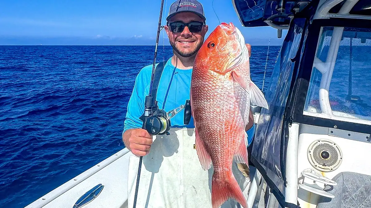 Nick Petrou with a fish he caught during a trip to Gulf Shores, Alabama.