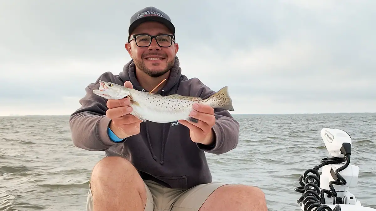 Nick Petrou shows off a fish he caught during a trip to Gulf Shores, Alabama.