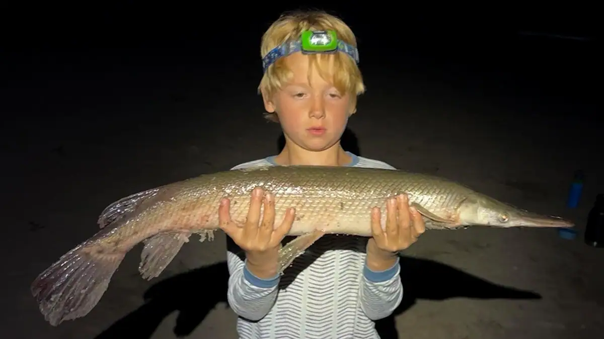 7-year-old Isaac Richert with his 30.5-inch Minnesota-state-record gar.