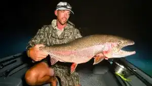 After Encountering Giant Rainbow Trout for Weeks, Fishing Guide Finally Catches It at Night