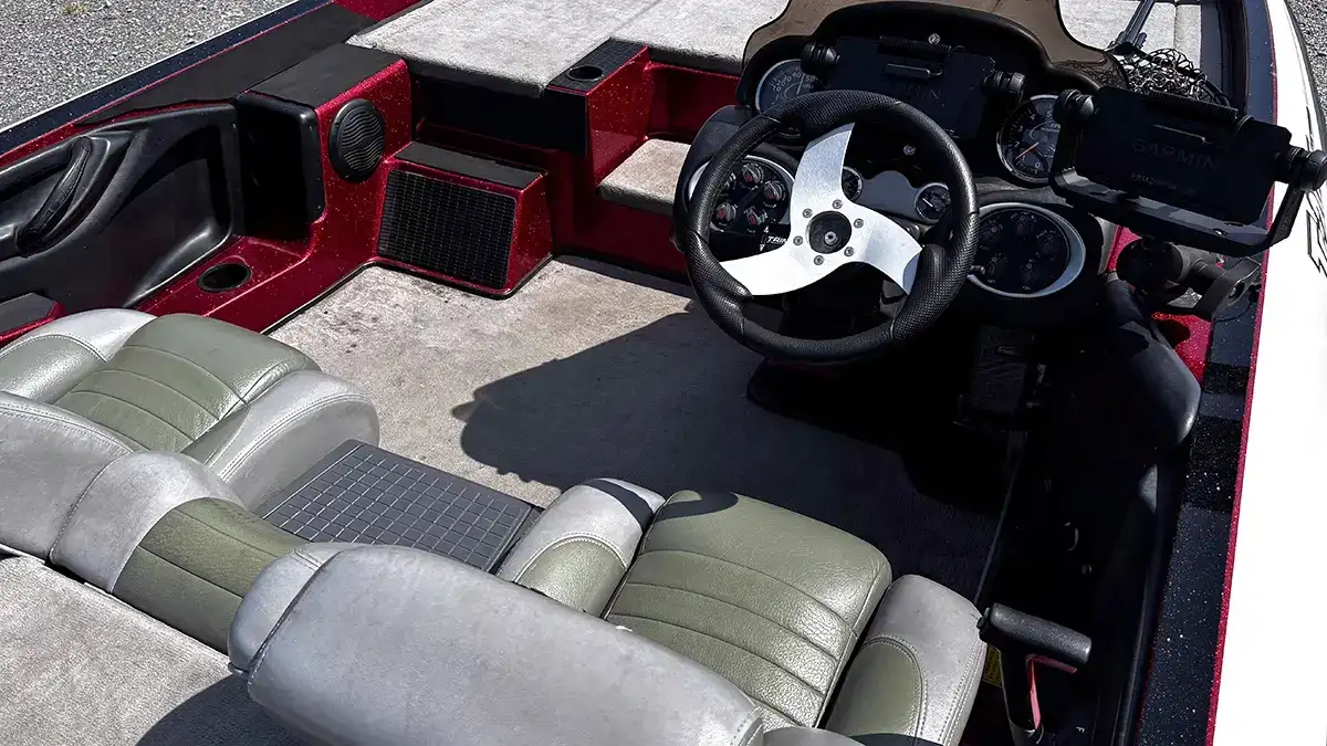 Get behind the wheel when buying a used boat.