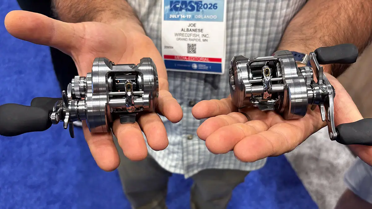 Comparing reels at ICAST 2026.
